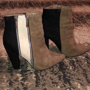 Paneled heeled ankle booties